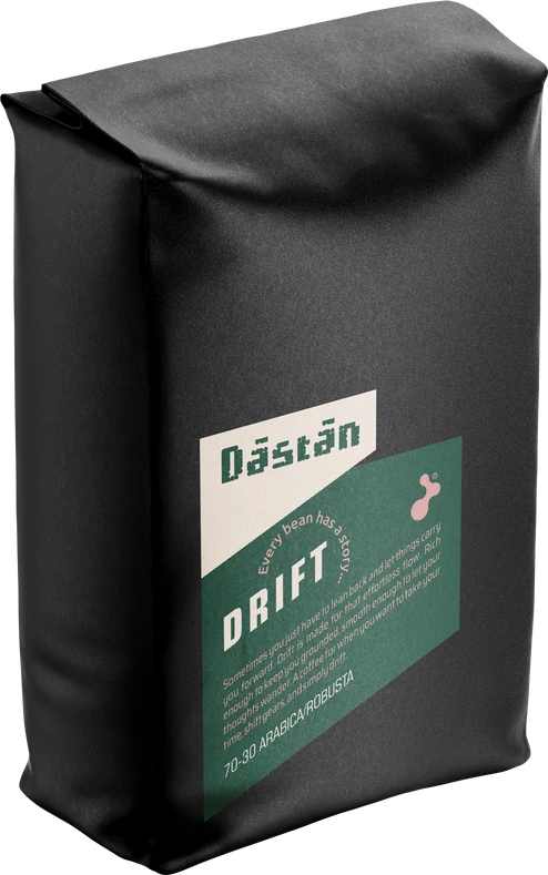 Black Dāstān Drift coffee bag with a dark green label